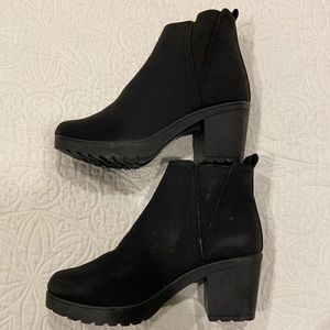 Black booties. Never worn